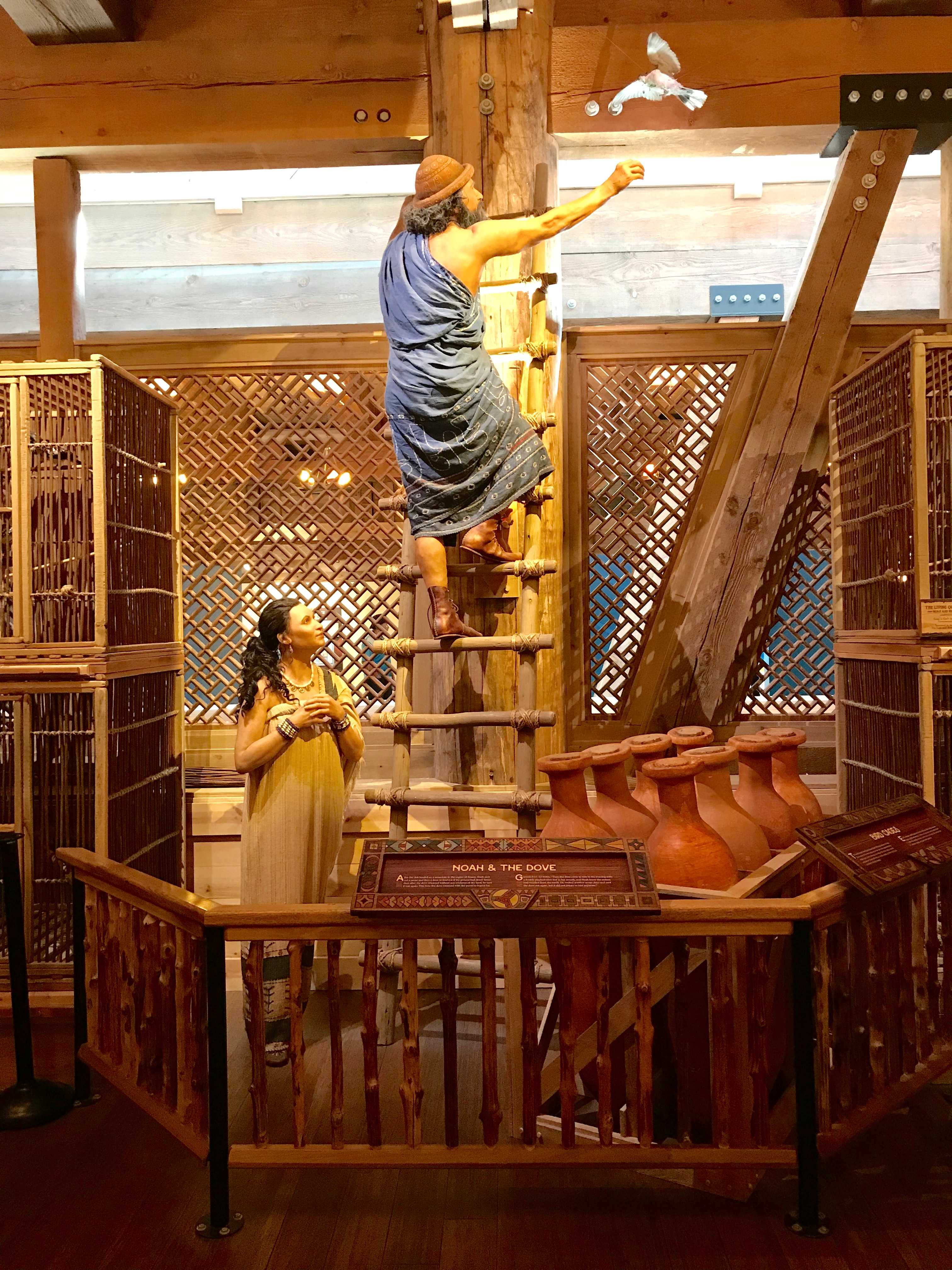 Depiction of Noah's family caring for animals aboard the Ark